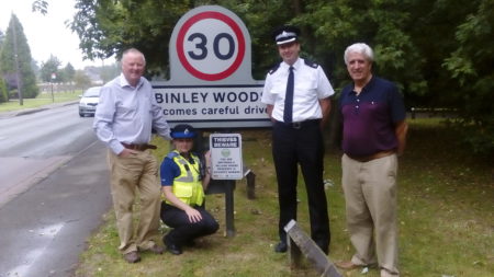 The new signs being put up on the roads into Binley Woods. From left, Paul Salisbury, Chair of Binley Woods Parish Council, PCSO Charlie Cawte and Superintendent David Gardner from Warwickshire Police and Steve Roberts, Parish Councillor responsible for Community Alerts and Safety.