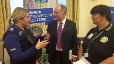 Warwickshire PCC Philip Seccombe talking to a PCSO and Carol Cotterill