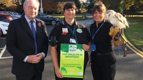 Philip Seccombe, Warwickshire Police and Crime Commissioner with Carol Cotterill, Chair of Warwickshire Rural Watch, and PC Lucy Whatmore from Bedworth Police Station holding one of the owls from the Nuneaton and Warwickshire Wildlife Sanctuary.