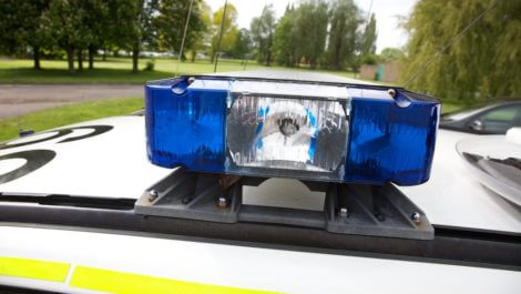 Blue lights on top of a police car