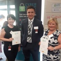 Cyber Crime Advisor Sam Slemensek presents Cyber Champions certificates to the delegates from the Family Intervention Counselling Service.