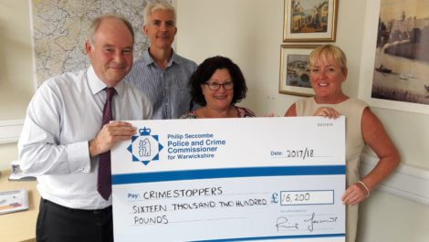 Warwickshire Police and Crime Commissioner hands over the funding to Crimestoppers representatives, from left, Warwickshire committee Vice Chair Rob Musgrove; Regional Manager Pauline Hadley and Senior Trust Manager Amanda Corcoran.