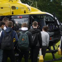 Academy students get up close with the helicopter and its controls