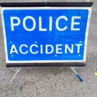 A Police Accident sign.