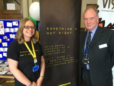 Katy Shipley from Barnardo's helping to promote the Something's Not Right campaign with Warwickshire PCC Philip Seccombe