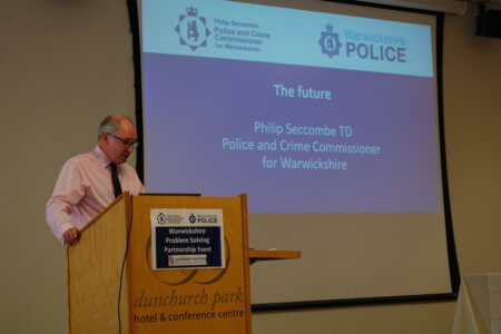 Philip giving his closing address at the Problem Solving Partnership Event.