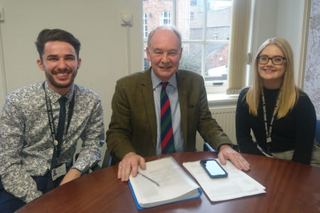 Warwickshire Police and Crime Commissioner Philip Seccombe (centre) with Cyber Crime Advisors Joseph Patterson and Abbey Baker.