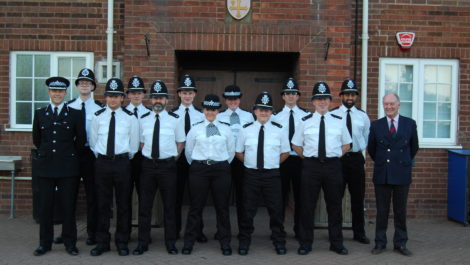 Assistant Chief Constable Alex Franklin Smith and Warwickshire Police and Crime Commissioner Philip Seccombe with the new police officers at their passing out ceremony at Warwick School