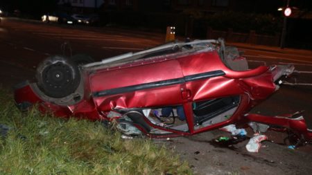 An overturned crashed car on the A5 near Atherstone