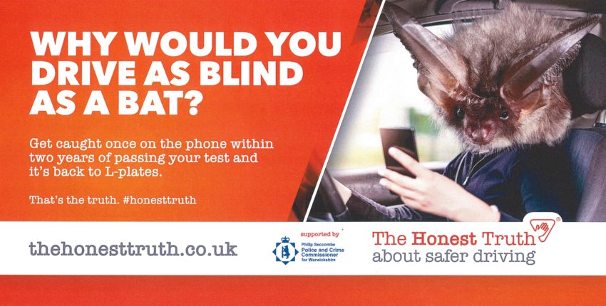 The Honest Truth billboard advertisement, showing a car driver with a bat's head looking at a mobile phone, with the caption Why would you drive as blind as a bat?