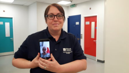 Bidvest Noonan detention officer Clare Harvey in Nuneaton custody with Independent Custody Visitor Sue Such pictured via video conference call on the mobile phone. 