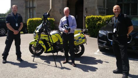 PCC Philip Seccombe (centre) shows off the new camera equipment with Sgt Shaun Bridle (left) and Inspector Jem Mountford from Warwickshire Police