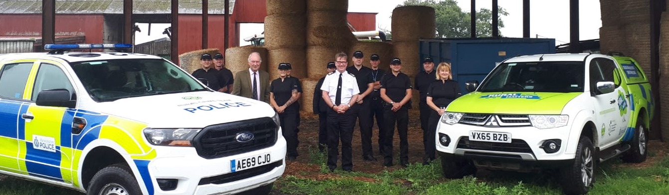 The PCC and Chief Constable pose on a farm with the expanded rural crime team