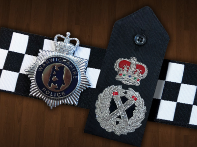 Chief Constable epaulettes and Warwickshire Police cap badge