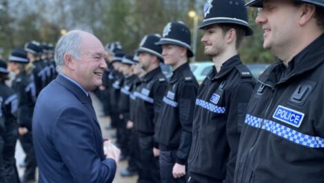Police and Crime Commissioner Philip Seccombe talks to a line of police officers