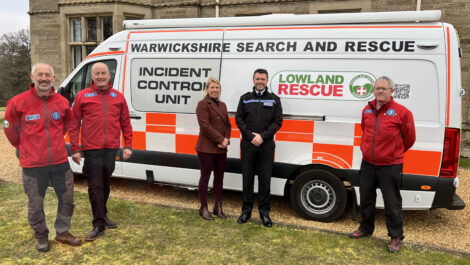The Deputy Commisioner, Deputy Chief Constable and SAR staff stand with the new van