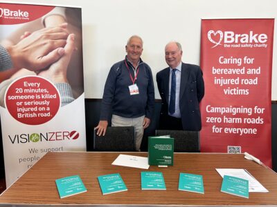 The PCC and Independent Road Victim Advisor stand in front of Brake banners
